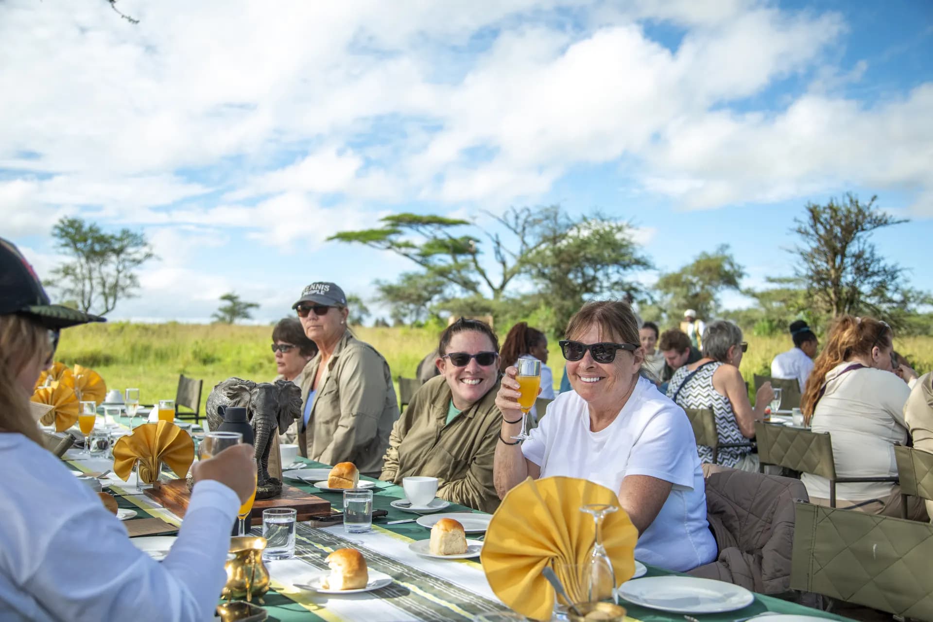 Champagne bush breakfast table set on the plains after a Serengeti balloon safari